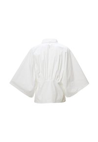 Blusa bianca in cotone con vita arricciata, maniche larghe e colletto. Il retro presenta un design liscio e pulito, senza embellishments.