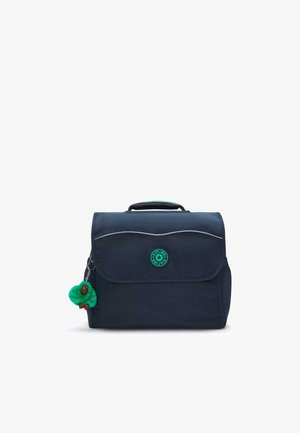 Navy blue fabric bag with a flap closure, green logo, white stitching, and a green fluffy keychain featuring a small animal figurine.