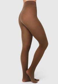 Collant marrone opaco con una consistenza liscia, vita alta e copertura completa del piede. Progettati per una vestibilità senza cuciture e una distribuzione uniforme del colore.