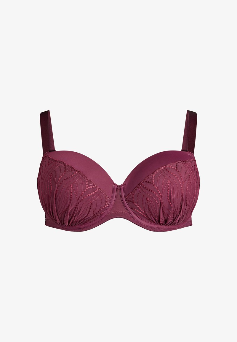 Mauve rintaliivi, jossa on tukikaaria ja muotoillut kupit. Kupit koristeltu brodeeratulla lehtikuviolla ja ohuilla säädettävillä olkaimilla. Silkkinen pinta.