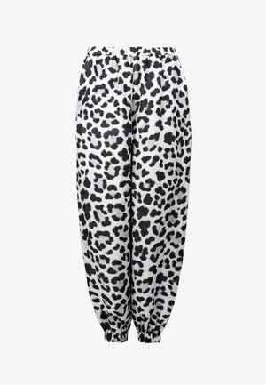Leopard print joggers, featuring a black and white pattern, elastic waistband, and gathered cuffs at the ankles. Soft fabric texture.