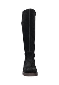Knee-high black suede boot featuring a rounded toe and a slim, flat sole. Side zipper closure and minimal stitching detail. Smooth texture.