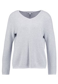 Vaaleanharmaa neulepaita V-kaula-aukolla, pitkillä hihoilla ja ribbineuloksella. Rentoa istuvuutta ja keskellä edessä kulkeva sauma.