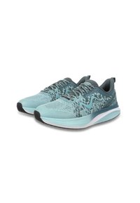 Scarpe sportive azzurro chiaro con tomaia in rete, motivo testurizzato, dettagli grigi e suole in gomma nera. Presentano lacci e collo imbottito.