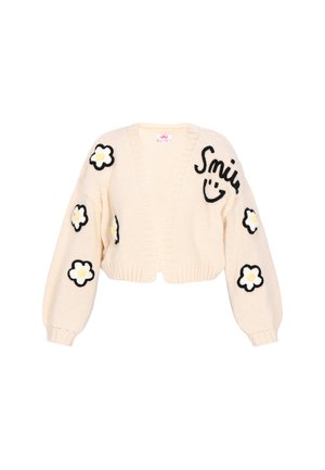 Cremefarbener, kurz geschnittener Cardigan mit V-Ausschnitt, verziert mit schwarzen Blumenstickereien und dem Text "Smile" in Schwarz auf dem linken Ärmel.
