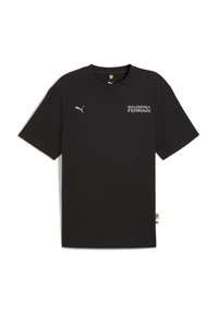 Sort bomulds T-shirt med korte ærmer, der har et Puma-logo og teksten "SCUDERIA FERRARI" i hvid. Rund hals, løs pasform.
