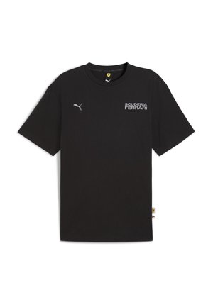 Black cotton T-shirt with short sleeves, featuring a Puma logo and "SCUDERIA FERRARI" text in white. Round neck, relaxed fit.