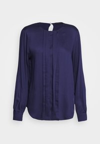 Mörkblå blus med långa ärmar, med en rund halsringning, vertikala veck och en nyckelhålsöppning bak med knäppning. Slät textur.