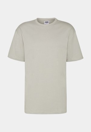 Lys grå bomulds t-shirt med korte ærmer, rund halsudskæring og en afslappet pasform. Ingen synlige mønstre eller design. Flade sømme og standard længde.