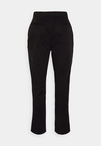 Black pants with an elastic waist, slim fit, and two back pockets. Smooth fabric texture and straight leg cut.