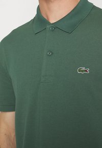 Lacoste Sport KURZARM - Polo - vert fonce