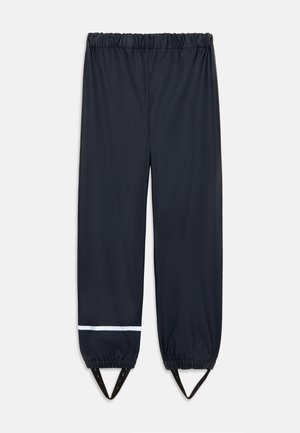 Sorte vandtætte bukser med elastisk talje og manchetter, reflekterende stribe på det ene ben og fodstropper for sikker pasform.