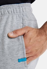 Arena UNISEX - Jogginghose - grau