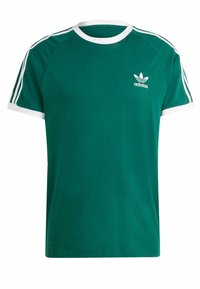Zelené bavlněné tričko s bílými doplňky, s kulatým výstřihem, krátkými raglánovými rukávy a třemi bílými pruhy na každém rameni. Zobrazeno logo Adidas.
