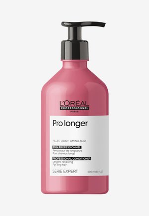 Roze plastic fles met een zwarte pompkap; het witte etiket toont de details "Pro langer" en "Professionele Conditioner". Inhoud van 500 ml.