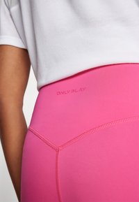 ONLY Play ONPJAM-3-SANA - Leggings - raspberry sorbet