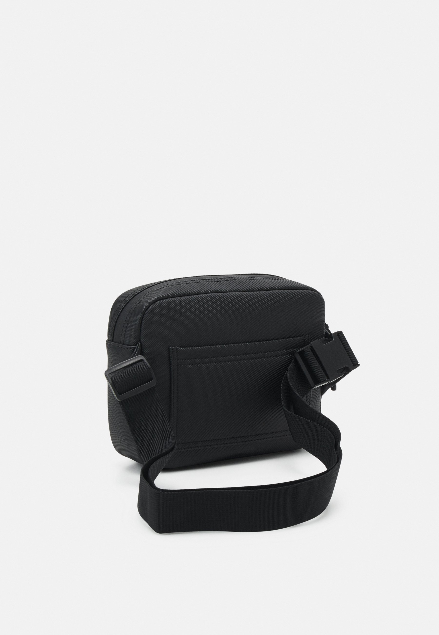 Lacoste REPORTER BAG UNISEX - Cross body bag - noir/black