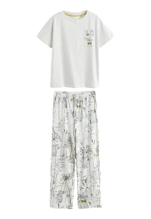 Halli lühikeste varrukatega T-särk, millel on väike taskutrükk, kombineeritud valgete pidžamapükstega, millel on siniste ja kollaste lille- ning loomamotiividega illustratsioonid.