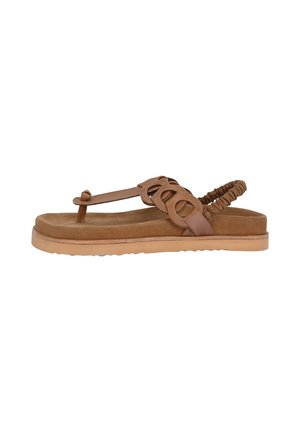 Sandalo marrone con una morbida soletta in suede, design a strisce sottili, fori circolari e suola in gomma testurizzata. Cinghia all'altezza del tallone regolabile con arricciatura.