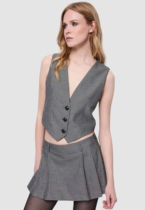 Smanicato - grigio spigato