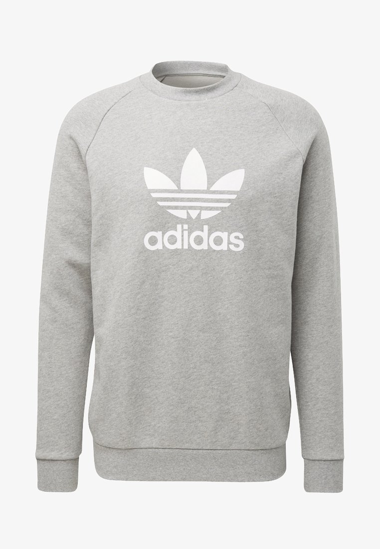 Šedá mikina s kulatým výstřihem vyrobená z bavlněné směsi. Obsahuje velké bílé logo Adidas a design se třemi pruhy. Klasický volný střih.