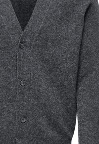 Gray wool cardigan with a V-neck design, featuring five dark buttons and ribbed cuffs. Soft texture and even knit throughout.