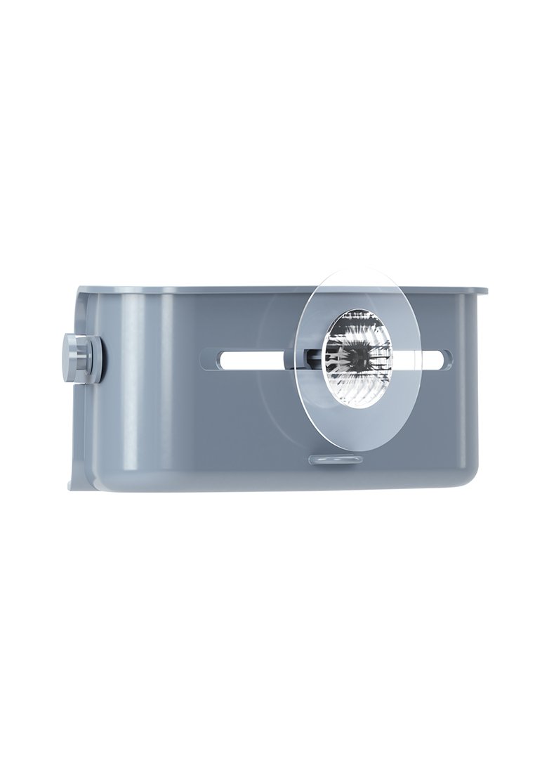 Szary plastikowy uchwyt z okrągłą przezroczystą soczewką. Posiada dwa boczne otwory i okrągły pokrętło regulacyjne po lewej stronie.