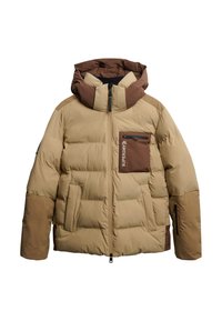 Khaki dunjakke med en brun hætte, der har lynlås foran, sidelommer og en brystlomme med lynlås, quiltet tekstur over det hele.