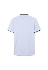 Polo a maniche corte di colore azzurro chiaro con motivo a pois, colletto navy e bordi a contrasto. Realizzato in materiale traspirante.