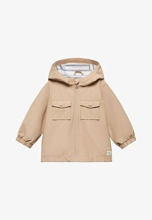 Veste à capuche beige pour enfant avec fermeture éclair devant, deux poches poitrine à boutons, poignets élastiques et doublure intérieure rayée.