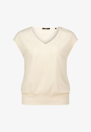 Blusa color crema con scollo a V, maniche corte a forma di cappuccio e vita leggermente arricciata. Realizzata in tessuto leggero e texturizzato.