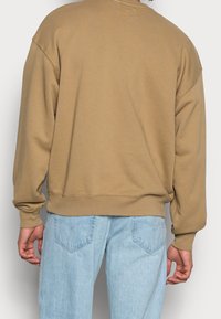 Levi's® Sweatshirt - ochre