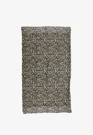 Prostokątny materiał z czarnym tłem, przedstawiający abstrakcyjny beżowy wzór plemienny z linii, kropek i kątowych kształtów.