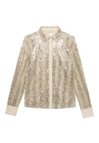 Blusa beige a maniche lunghe con paillettes argentate lucide, davanti con bottoni, colletto appuntito e polsini color crema.