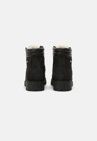 Tamaris Botas para la nieve - black