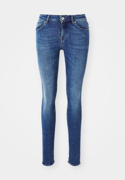 Blue denim skinny jeans with a smooth texture, mid-rise waist, five pockets, and light fading on the thighs. Features metal button and zip fly.