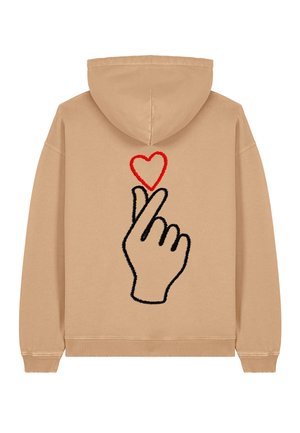 Felpa beige con un contorno nero di una mano che fa un gesto a cuore, con un cuore rosso sopra le dita. Tessuto morbido, vestibilità rilassata.