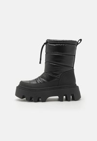 FLORA PUFFER BOOT - Platform ankle boots - black