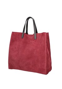 Borsa a tracolla rossa in suede con manici in pelle nera. Forma rettangolare, texture liscia, senza hardware visibile o motivi, design minimalista.
