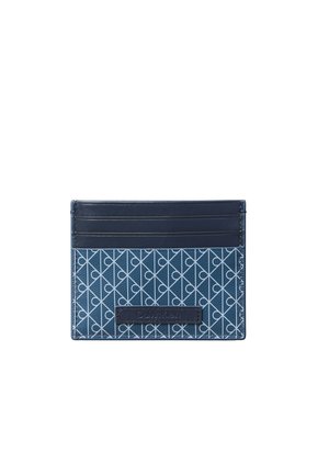 Porte-cartes fin bleu marine avec motif géométrique et quatre emplacements pour cartes sur le dessus, avec un patch logo rectangulaire cousu à l’avant.