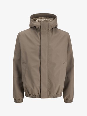 Rudos spalvos gobtuvu striukė su paslėptu priekiu užtrauktuku, dviem šoninėmis kišenėmis, elastiniu rankogaliu ir elastine apačia, skirta dėvėti lauke.