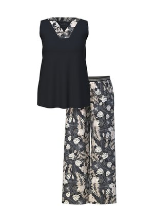 Czarny bezrękawnik z kwiatowym wzorem na dekolcie, w zestawieniu z luźnymi spodniami o ciemnym tle i jasnymi kwiatowymi wzorami.