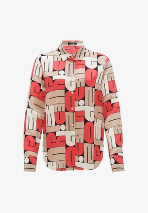 Overhemd met knopen in een geometrisch patroon in rood, crème en zwart. Gemaakt van gladde stof met een kraag en lange mouwen.