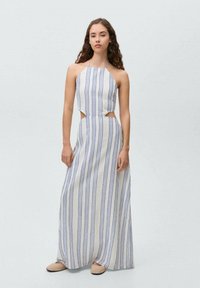 Maxi dress in white with blue vertical stripes. Halter neckline, cut-out side details. Soft fabric with a loose, flowing shape.