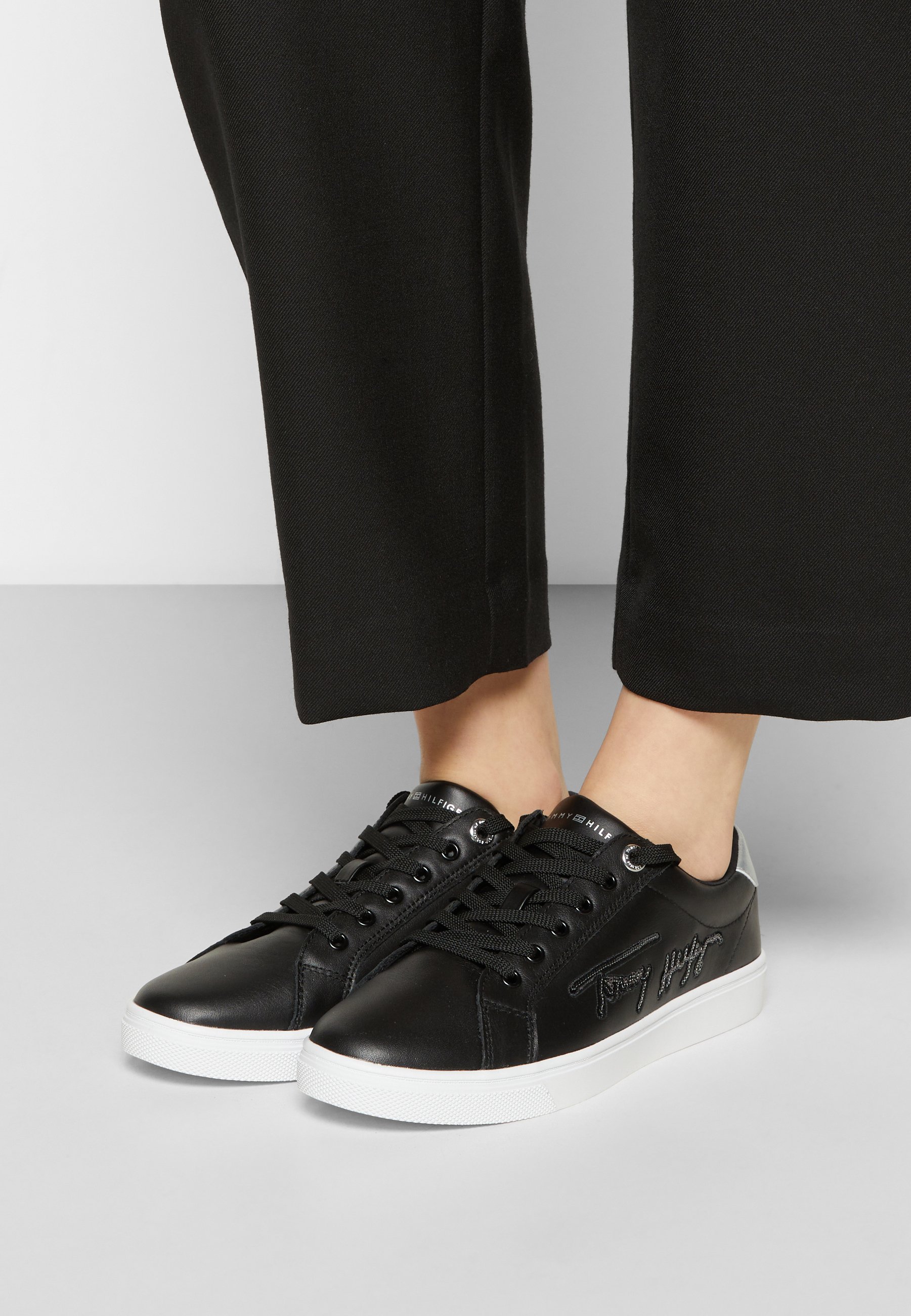 black cupsole trainers