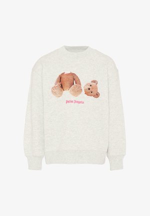 Jasnoszara bluza z grafiką misia podzielonego na głowę i ciało, nad którym znajduje się napis "Palm Angels" w różowej, gotyckiej czcionce.