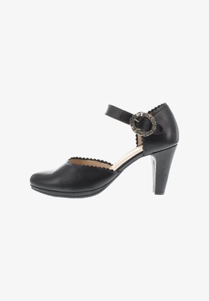 Schwarzer Mary-Jane-Schuh aus Leder mit geschwungenen Kanten, einem silbernen, dekorativen Schnallenriemen und einem konischen Mittelhochabsatz.