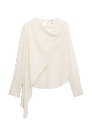 Blouse crème à manches longues avec détail drapé asymétrique à l'avant et larges poignets, dotée d'une petite fermeture par bouton clé à l'encolure arrière.