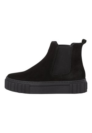 Black suede Chelsea boots with elastic side panels, a thick black rubber sole featuring vertical ridges, and a pull tab at the heel.