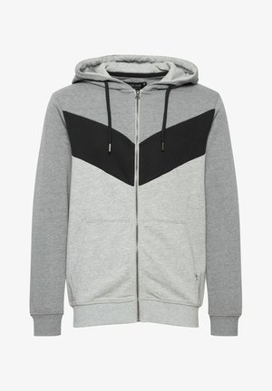 Siva zip-up kapuca z značko črnega črtast vzorca na prsih, s kapuco z vrvicami in stranskimi žepi, izdelana iz mehkega bombažnega materiala.